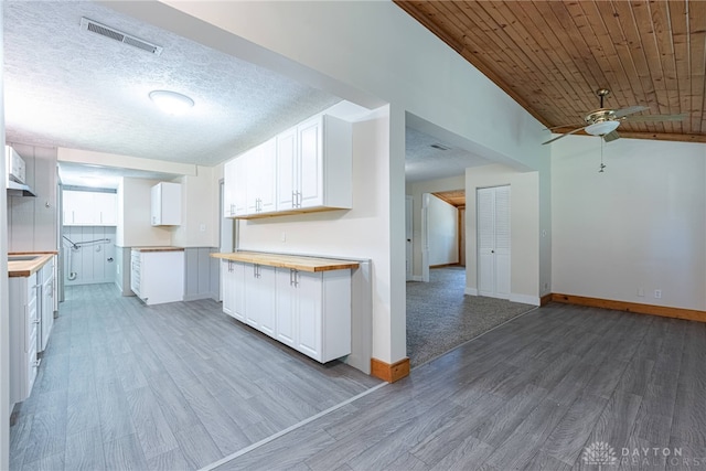 989 Ogden Rd, Adams Twp, OH 45177 - kitchen with a ceiling fan, light wood-type flooring, white cabinetry, butcher block counters, and open floor plan