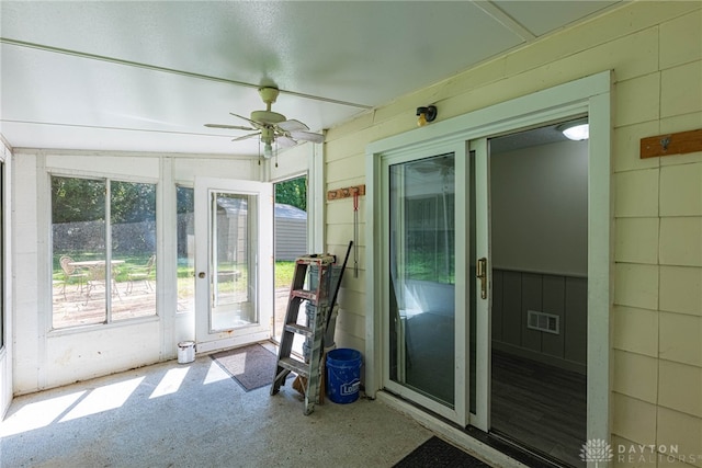 989 Ogden Rd, Adams Twp, OH 45177 - unfurnished sunroom featuring ceiling fan and carpet floors