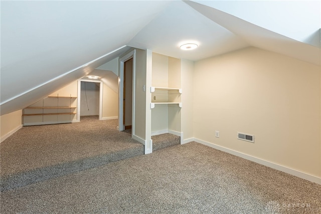 989 Ogden Rd, Adams Twp, OH 45177 - additional living space with vaulted ceiling and carpet flooring