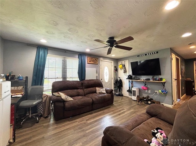 191 Ardmore Dr, Cedarville, OH 45314 - living area with wood finished floors, ceiling fan, recessed lighting, and a textured ceiling