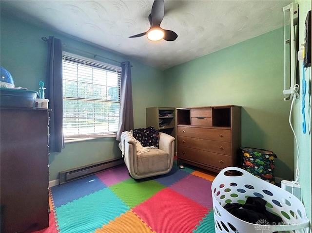 191 Ardmore Dr, Cedarville, OH 45314 - bedroom with baseboard heating and ceiling fan