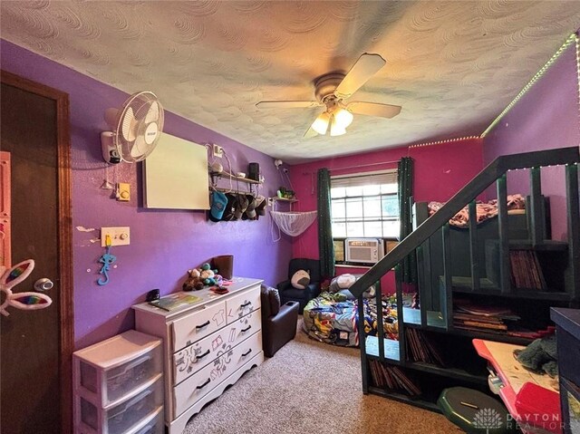 191 Ardmore Dr, Cedarville, OH 45314 - carpeted bedroom with cooling unit, a textured ceiling, and ceiling fan