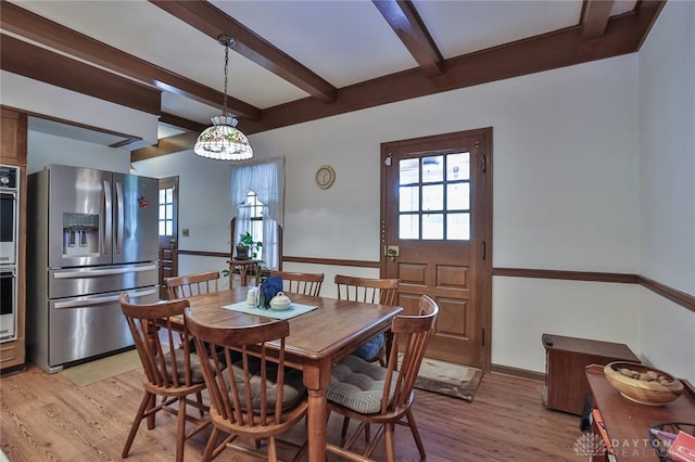 11 Peterson Pl, Wilmington, OH 45177 - dining room with light wood-type flooring and beam ceiling