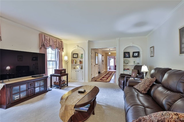 11 Peterson Pl, Wilmington, OH 45177 - living room featuring crown molding, built in features, and light colored carpet