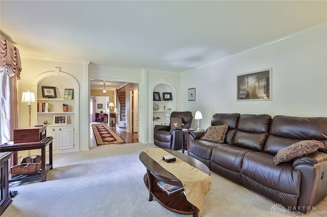 11 Peterson Pl, Wilmington, OH 45177 - living room featuring ornamental molding, built in features, and carpet floors