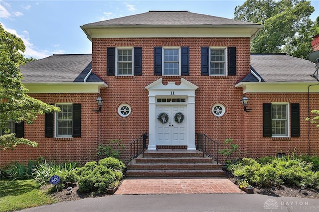 11 Peterson Pl, Wilmington, OH 45177 - view of front of house with brick siding and a shingled roof