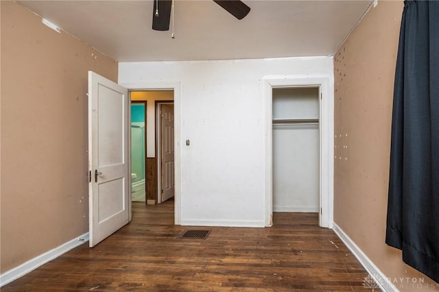 718 Hook Rd, Xenia, OH 45385 - unfurnished bedroom featuring wood finished floors, a closet, and ceiling fan
