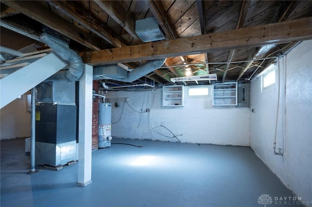 718 Hook Rd, Xenia, OH 45385 - basement featuring water heater, electric panel, and heating unit