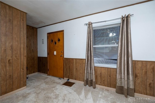 718 Hook Rd, Xenia, OH 45385 - carpeted spare room with wooden walls and a wainscoted wall