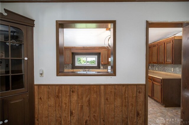 718 Hook Rd, Xenia, OH 45385 - detailed view of wainscoting, wooden walls, and tasteful backsplash