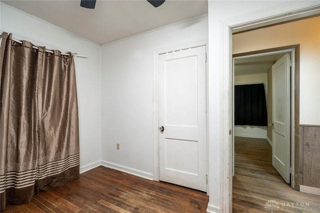718 Hook Rd, Xenia, OH 45385 - unfurnished bedroom featuring hardwood / wood-style flooring, crown molding, and ceiling fan