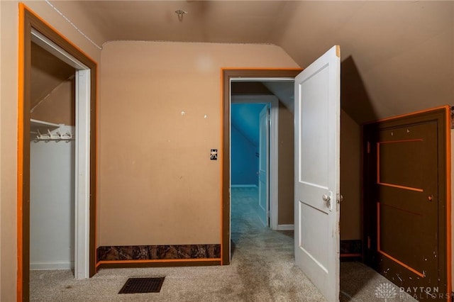 718 Hook Rd, Xenia, OH 45385 - corridor featuring lofted ceiling and carpet floors