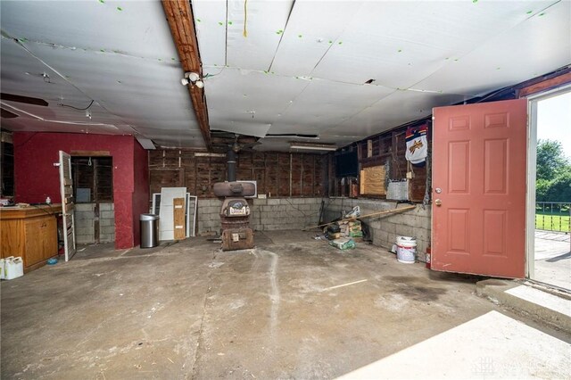 718 Hook Rd, Xenia, OH 45385 - garage featuring a wood stove