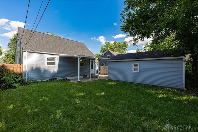 607 Alexander Dr, Dayton, OH 45403 - rear view of property featuring a patio area and an outdoor structure