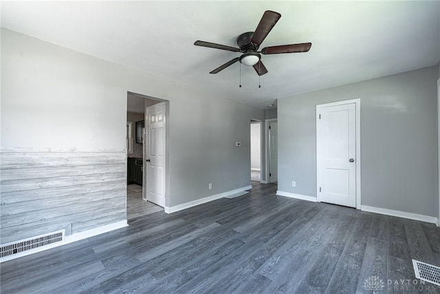 607 Alexander Dr, Dayton, OH 45403 - unfurnished room featuring a ceiling fan and dark wood-style flooring
