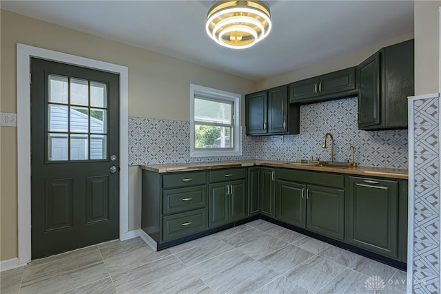 607 Alexander Dr, Dayton, OH 45403 - kitchen featuring green cabinets and wooden counters
