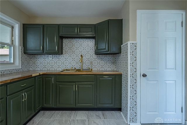 607 Alexander Dr, Dayton, OH 45403 - kitchen with green cabinetry and butcher block counters