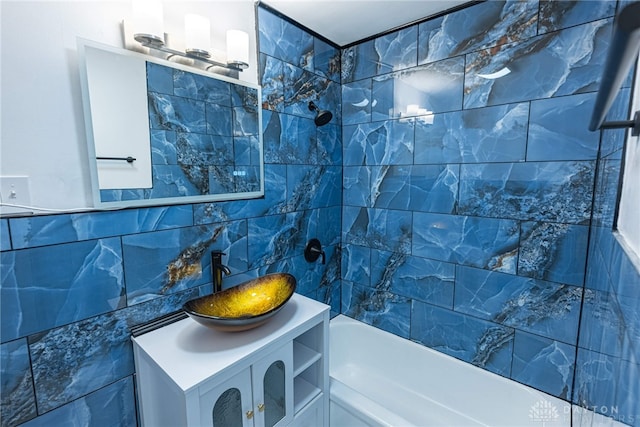 607 Alexander Dr, Dayton, OH 45403 - full bathroom with bathtub / shower combination, tile walls, and vanity