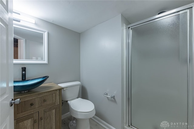 607 Alexander Dr, Dayton, OH 45403 - bathroom with vanity and a stall shower