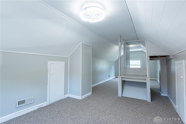 607 Alexander Dr, Dayton, OH 45403 - bonus room featuring carpet and vaulted ceiling