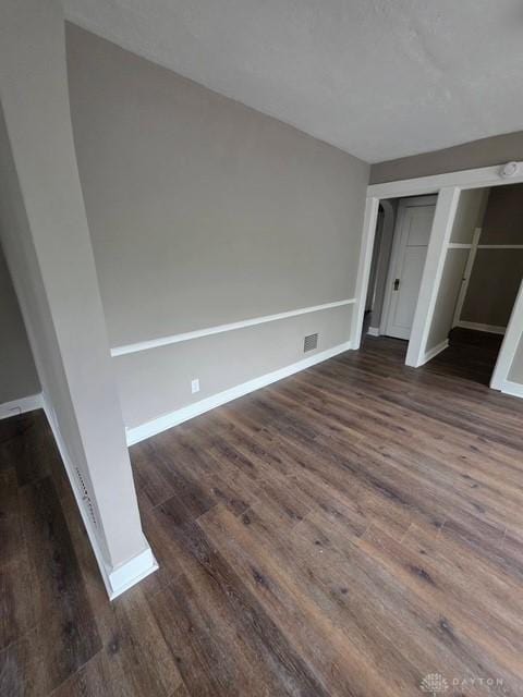 2324 Eastview Unit 2322, Dayton, OH 45405 - unfurnished bedroom featuring dark wood-style floors and a closet