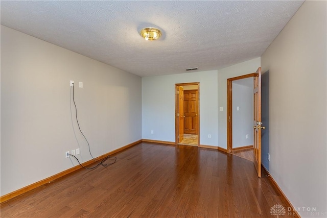 7135 Salem Crossing Pl, Englewood, OH 45322 - unfurnished room featuring wood finished floors and a textured ceiling