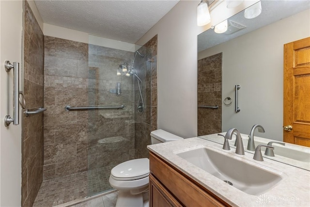 7135 Salem Crossing Pl, Englewood, OH 45322 - full bath featuring tiled shower, vanity, a textured ceiling, and tile patterned flooring