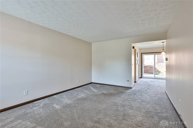 4530 Shawnray Dr Unit 84, Middletown, OH 45044 - unfurnished room with carpet flooring and a textured ceiling