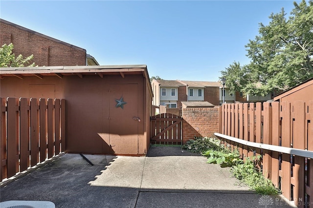 4530 Shawnray Dr Unit 84, Middletown, OH 45044 - view of patio featuring a gate and a residential view