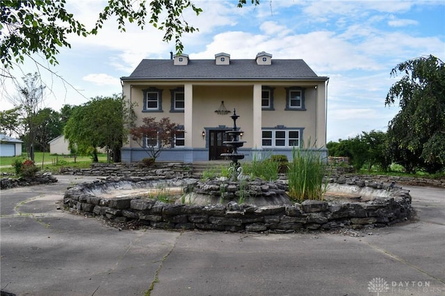 13181 Eaton Pike Unit 13181, New Lebanon, OH 45345 - greek revival house with stucco siding
