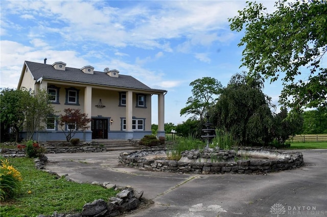 13181 Eaton Pike Unit 13181, New Lebanon, OH 45345 - greek revival house featuring stucco siding