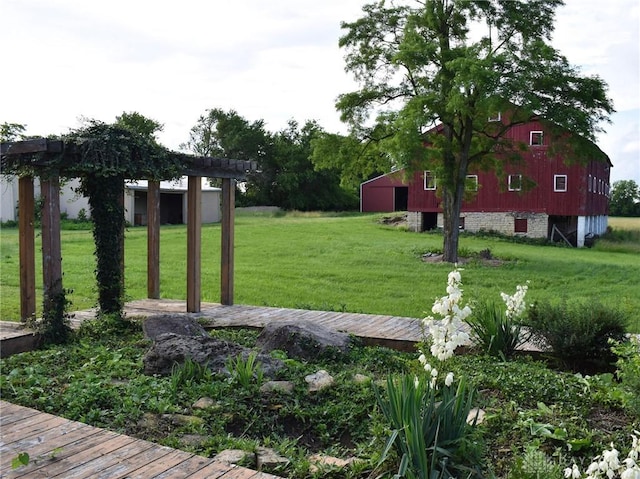 13181 Eaton Pike Unit 13181, New Lebanon, OH 45345 - view of green lawn with a pergola, a barn, and an outbuilding
