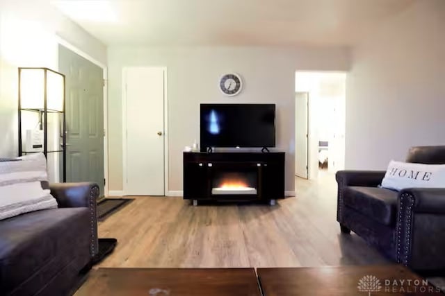 4646 Wayne Meadows Cir Unit 4640, Dayton, OH 45424 - living room featuring wood finished floors and baseboards