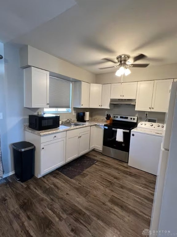 4646 Wayne Meadows Cir Unit 4640, Dayton, OH 45424 - kitchen featuring stainless steel range with electric stovetop, black microwave, washer / dryer, under cabinet range hood, and dark wood-style flooring