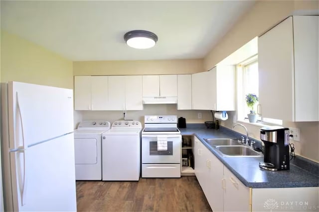 4646 Wayne Meadows Cir Unit 4640, Dayton, OH 45424 - kitchen featuring white appliances, washer and dryer, dark countertops, white cabinets, and under cabinet range hood