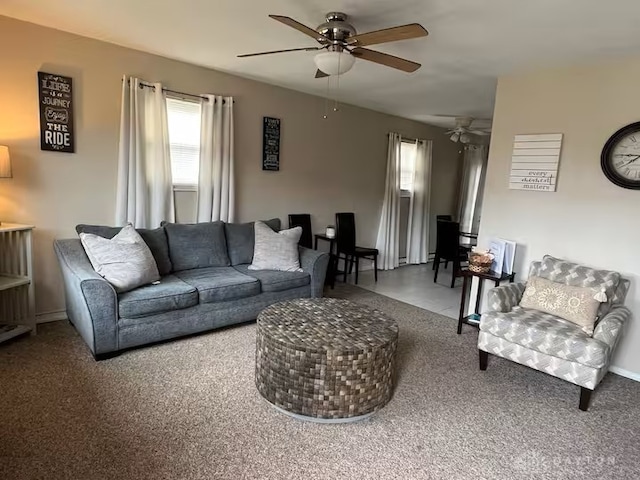 4646 Wayne Meadows Cir Unit 4640, Dayton, OH 45424 - living room featuring a ceiling fan and carpet flooring