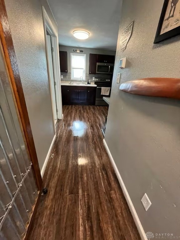 4646 Wayne Meadows Cir Unit 4640, Dayton, OH 45424 - corridor with dark wood-style floors and a textured wall