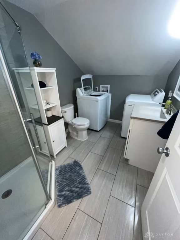 4646 Wayne Meadows Cir Unit 4640, Dayton, OH 45424 - full bathroom featuring independent washer and dryer, vanity, wood tiled floors, lofted ceiling, and a shower stall