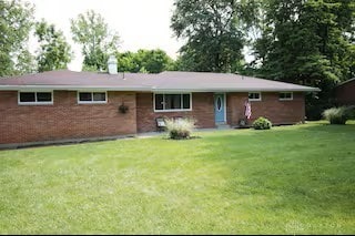 4646 Wayne Meadows Cir Unit 4640, Dayton, OH 45424 - view of front of home with a front yard and brick siding
