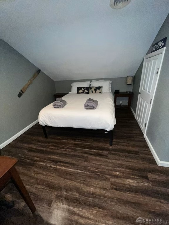 4646 Wayne Meadows Cir Unit 4640, Dayton, OH 45424 - bedroom with lofted ceiling and wood finished floors