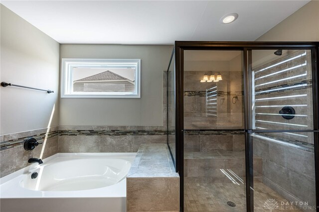 225 Woodstream Dr, Springboro, OH 45066 - bathroom with a garden tub and a stall shower