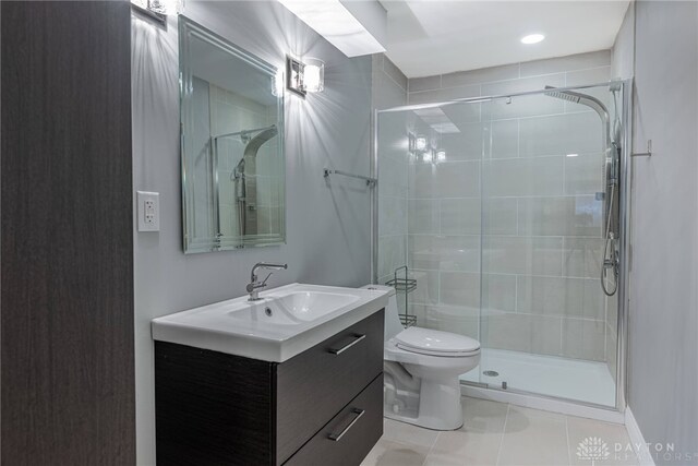 225 Woodstream Dr, Springboro, OH 45066 - bathroom featuring vanity, a stall shower, and tile patterned flooring