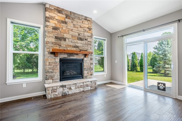 225 Woodstream Dr, Springboro, OH 45066 - unfurnished living room with lofted ceiling, a fireplace, and wood finished floors
