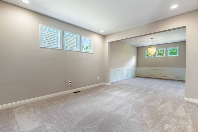 225 Woodstream Dr, Springboro, OH 45066 - empty room with light carpet, healthy amount of natural light, recessed lighting, and wainscoting