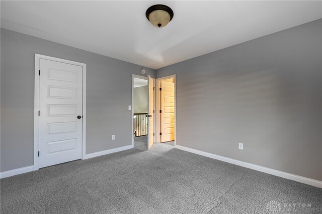225 Woodstream Dr, Springboro, OH 45066 - unfurnished bedroom featuring baseboards and carpet floors
