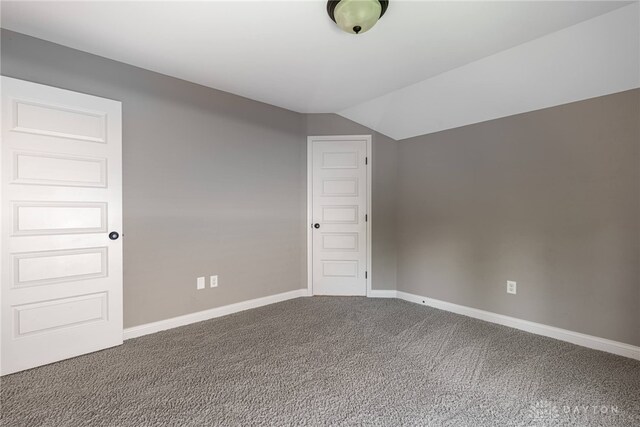 225 Woodstream Dr, Springboro, OH 45066 - carpeted empty room featuring baseboards and vaulted ceiling