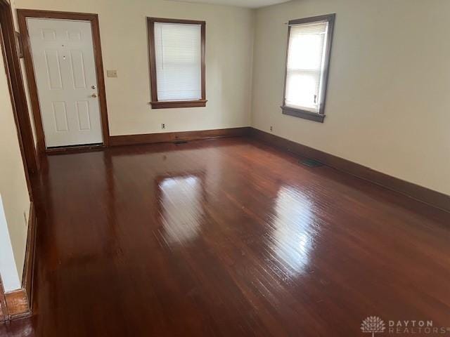 417 Sandalwood Dr, Dayton, OH 45405 - unfurnished room with wood finished floors and baseboards