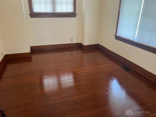 417 Sandalwood Dr, Dayton, OH 45405 - spare room with dark wood-style flooring