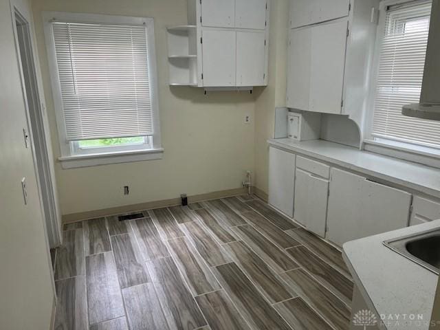 417 Sandalwood Dr, Dayton, OH 45405 - washroom featuring wood tiled floors and baseboards