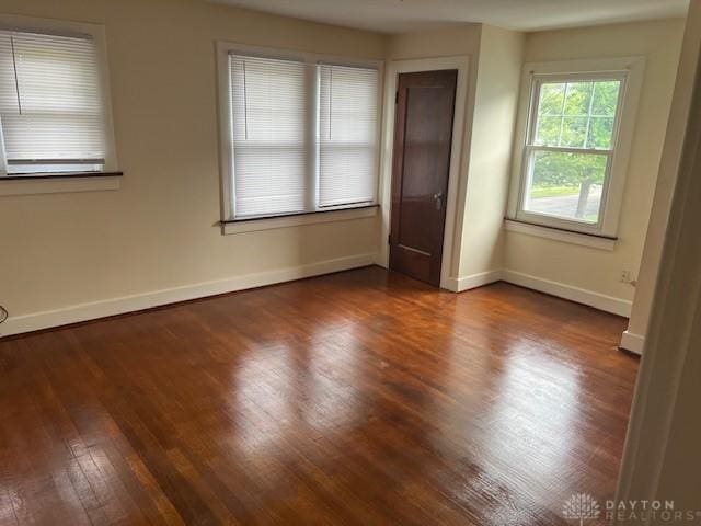 417 Sandalwood Dr, Dayton, OH 45405 - spare room featuring dark wood-style flooring